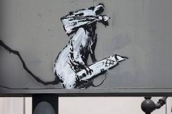 L'&oelig;uvre de Banksy, Fifty years since the uprising in Paris 1968. The birthplace of modern stencil art, volée  sur le panneau d'entrée du parking du Centre Georges Pompidou à Paris. - Crédit :  Photo Banksy